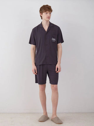 Model wearing COOL MEN'S Rayon Logo Pajama Sleep Shirt in dark hue, showcasing elegant and comfortable sleepwear by Gelato Pique USA.