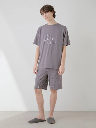 Man wearing Gelato Pique USA rayon logo motif T-shirt, premium loungewear, showcasing relaxed and cool style for sleepwear.