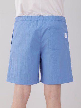 Vibrant blue men's nylon lounge shorts with a back pocket and Gelato Pique logo, offering a comfortable and breathable fit.