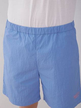 Vibrant blue men's nylon lounge shorts by Gelato Pique USA, offering a lightweight and breathable fit for summer days.