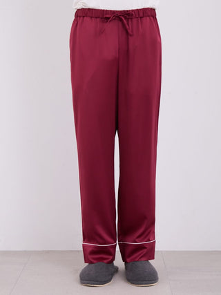 Men's piping satin pajama pants in burgundy with white accents, showcasing comfortable and luxurious sleepwear.