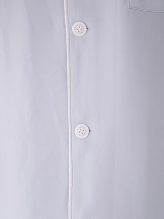 Close-up of men's satin shirt with button-down design by Gelato Pique, showcasing smooth, premium fabric and elegant detailing.