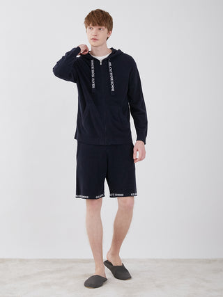 Man wearing Men's Smoothie Light Comfy Lounge Shorts and hoodie, showcasing stylish and comfortable home loungewear.