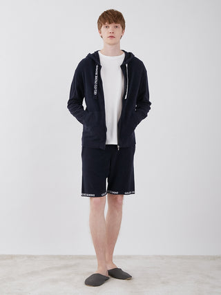 Man wearing Men's Smoothie Light Comfy Lounge Shorts with hoodie, showcasing comfortable and stylish loungewear