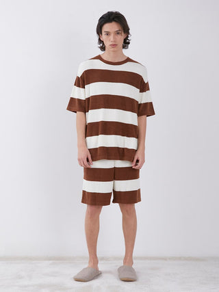 Man wearing brown and white striped loungewear shorts set, showcasing comfort and style in Smoothie Light fabric for men.