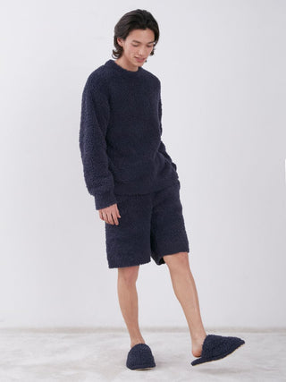 Person wearing Gelato Cozy & Fluffy Lounge Shorts with matching top and slippers for luxury comfort.