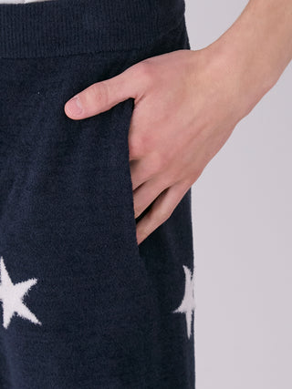 Close-up of Men's Air Mocostar Lounge Shorts in navy with star jacquard pattern, showcasing soft Air Moco fabric and side pocket detail.