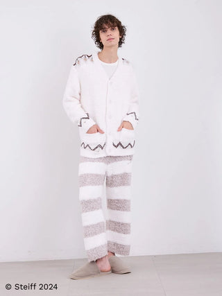 Model wearing Steiff Men's Gelato 2 Border Fuzzy Pajama Pants with wide-striped pattern, showcasing soft, fluffy knit fabric in neutral tones.