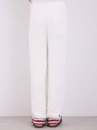 Cozy white feather-soft pajama pants for men, perfect for lounging and relaxation during the holiday season.