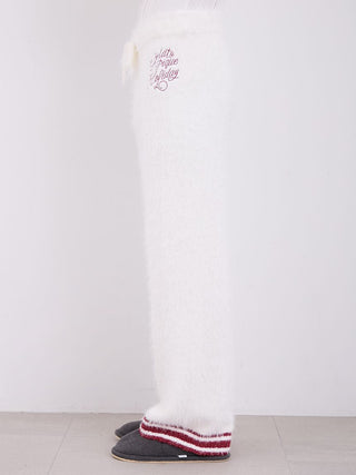 Side view of men's feather pajama pants, white with red stripes, showcasing soft and cozy fabric for ultimate comfort.