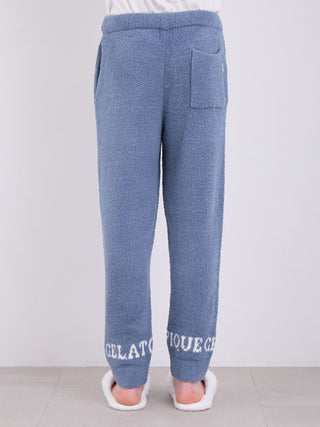 Blue men's pajama pants with "Gelato Pique" logo at cuffs, featuring ultra-soft fabric for comfort and relaxation.