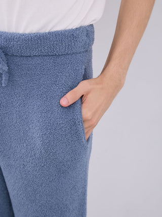 Close-up of men's powder blue pajama pants in ultra-soft Gelato fabric with hand in pocket.