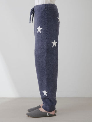 Side view of Powder Star Jacquard Lounge Pants in dark blue with star pattern, showcasing cozy and premium loungewear style by Gelato Pique.