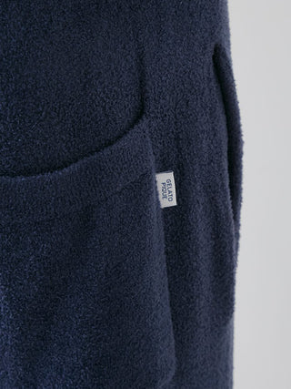 Close-up of navy Temperature-Control Smoothie Lounge Pants with soft fabric texture and a pocket featuring Gelato Pique USA label.