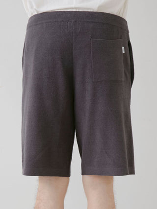 Back view of Gelato Pique USA Men's Air Moco Dinosaur Jacquard Lounge Shorts, showcasing premium loungewear in dark fabric.