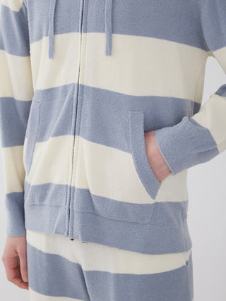 Person wearing Smoothie Lite 2 Border Loungewear Hoodie in blue and cream stripes, showcasing cozy and stylish design.