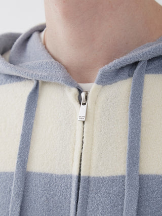 Close-up of Smoothie Lite 2 Border Loungewear Hoodie showing zip and geometric stripe design.