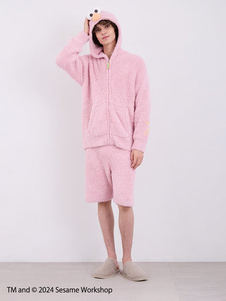 Men's Elmo hoodie and shorts loungewear set in fluffy fabric, featuring a pink color and cozy design, inspired by Sesame Street.