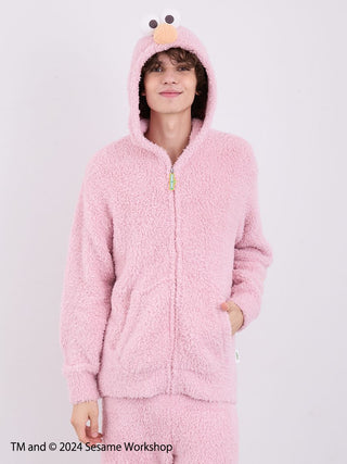 Elmo-inspired pink fluffy men's hoodie and shorts loungewear set from Sesame Street.