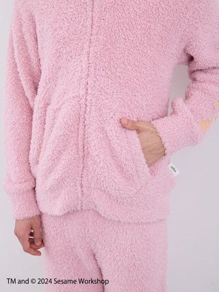 Men's Elmo Hoodie and Shorts in fluffy pink fleece fabric from Sesame Street loungewear collection.