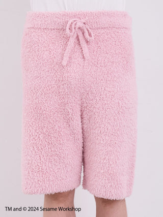 Men's pink fluffy shorts from Sesame Street Elmo loungewear set by Gelato Pique, featuring cozy fleece fabric.