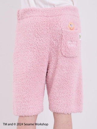 Pink fluffy men's Elmo shorts from Sesame Street loungewear set, featuring soft Gelato Pique fabric.