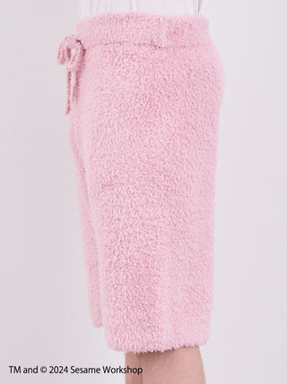 Pink fluffy shorts from the SESAME STREET Men's Elmo Loungewear Set by Gelato Pique.