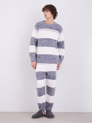 Man wearing a men's powder melange border fuzzy pullover sweater with relaxed fit and stylish stripe design, ideal for cozy comfort.