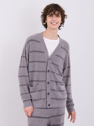 Model wearing men's Hot Smoothie button-up cardigan with V-neckline and front pockets by Gelato Pique, showcasing cozy style.