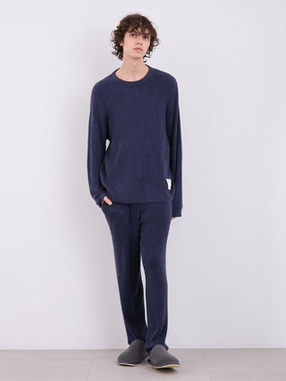 Model wearing Gelato Pique Men's Hot Smoothie Long Sleeves Ribbed Sweater in navy, showcasing relaxed fit and cozy style.
