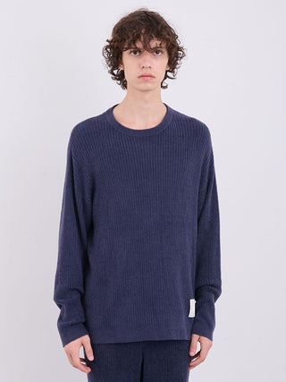 Man wearing Men's Hot Smoothie Long Sleeves Ribbed Sweater in navy blue by Gelato Pique.