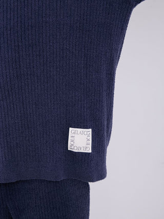 Close-up of Men's Hot Smoothie Ribbed Sweater in navy blue with Gelato Pique label, showcasing its luxurious ribbed texture.
