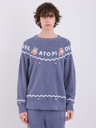 Model wearing Men's Nordic Pullover Sweater with teddy bear and zigzag jacquard design, made from soft Gelato Pique fabric.