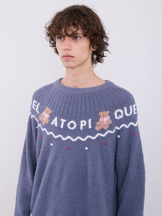 Man wearing blue Nordic pullover sweater with teddy bear jacquard design and zigzag pattern by Gelato Pique
