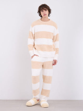 Man wearing mens Gelato 2 Border Pullover Sweater in white and beige stripes, showcasing cozy and stylish casual wear.