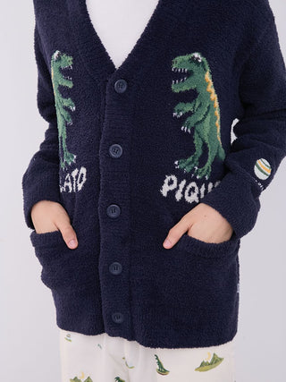 Men's powder dinosaur jacquard knit cardigan with playful dinosaur design, ultra-soft fabric, and versatile style by Gelato Pique.