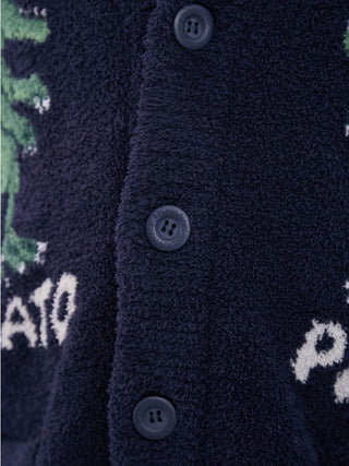 Close-up of Men's Powder Dinosaur Jacquard Knit Cardigan buttons and fabric texture, showcasing playful dinosaur design.