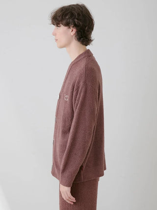 Side view of a model wearing a men's Baby Moco Chocolate Button-Up Cardigan, showcasing the plush texture and cozy design.
