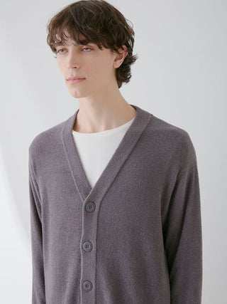 Model wearing Smoothie Lite Mens Button Up Cardigan by Gelato Pique USA, a premium loungewear and sleepwear V-neck cardigan in gray.