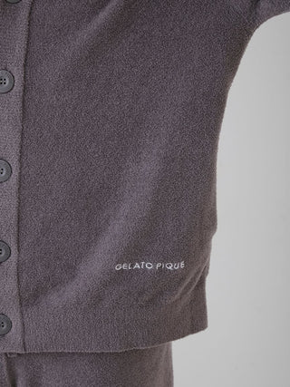 Close-up of Smoothie Lite men's button-up cardigan by Gelato Pique USA, featuring premium loungewear design and logo embroidery.