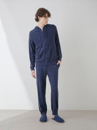 Model wearing a navy Temperature-Control Smoothie Zip-Up Hoodie and pants, showcasing lightweight warmth and breathability.