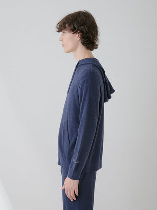 Side view of model wearing the Temperature-Control Smoothie Zip-Up Hoodie in navy blue, showcasing lightweight, breathable fabric for comfort.