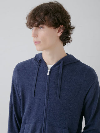 Model wearing a navy Temperature-Control Smoothie Zip-Up Hoodie, showcasing its lightweight and breathable design.