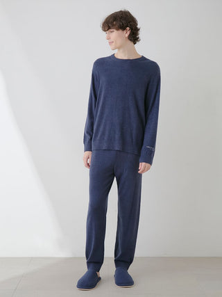Model wearing Men's Thermal Smoothie Pullover Sweater in navy, showcasing sleek, cozy loungewear with refined texture for casual layering.
