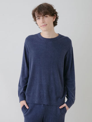 Man wearing a blue MEN’S Thermal Smoothie Pullover Sweater, showcasing sleek and cozy loungewear from Gelato Pique USA.