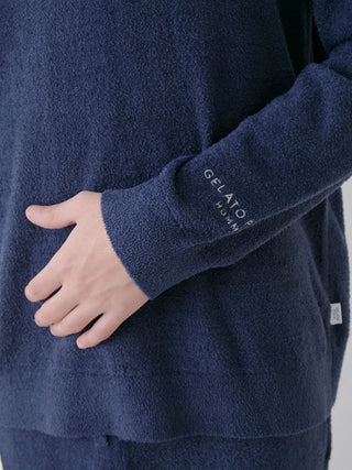 "Close-up of Gelato Pique USA men's thermal smoothie pullover sweater in navy, showcasing cozy, smooth texture and refined design."