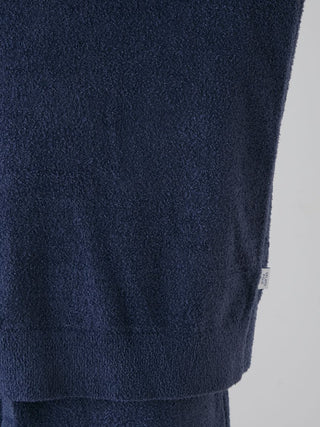 Close-up of a navy blue men's thermal pullover sweater, showcasing its smooth texture and minimalist design for cozy loungewear.