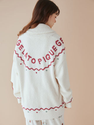 Back view of a cozy white Gelato Pique Nordic Shawl Collar Cardigan with red zigzag trim.