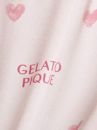 Close-up of Gelato Pique lounge shorts with pink heart motifs, showcasing soft fabric for comfort and playful style.