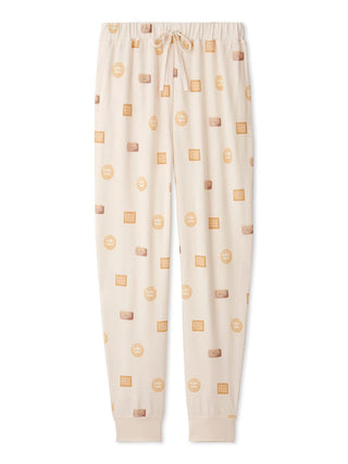 Comfortable waffle knit pajama pants with playful biscuit pattern, ideal for cozy lounging. Perfect for home relaxation and lazy weekends.